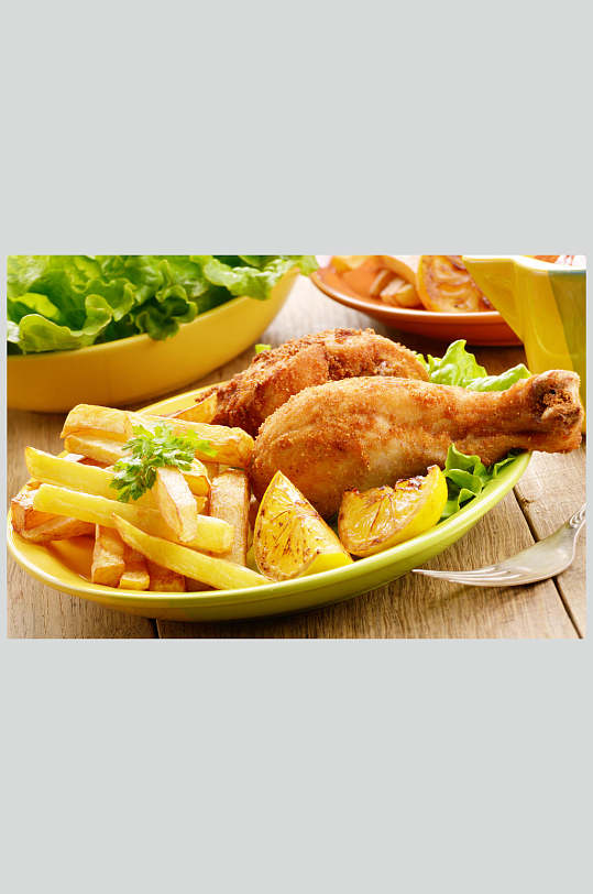炸鸡腿配薯条餐饮美食图片