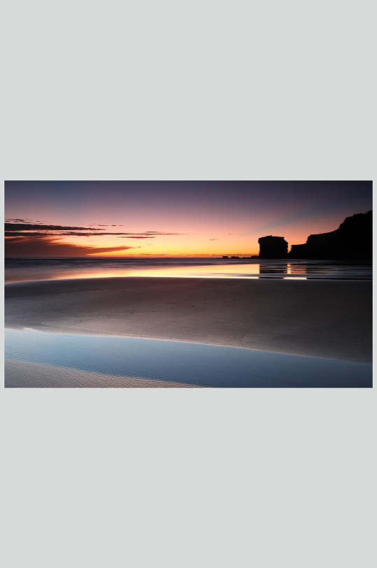 沙滩海边日落摄影图