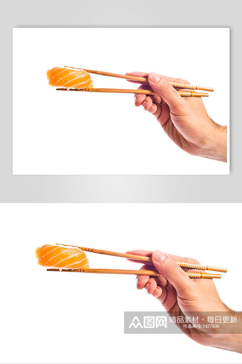 寿司美食手夹一个三文鱼卷摄影图素材
