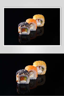 寿司美食三个漂亮里卷黑底摄影图
