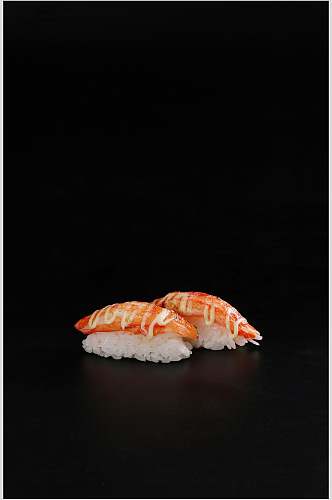寿司美食两个生虾手握寿司黑底摄影图
