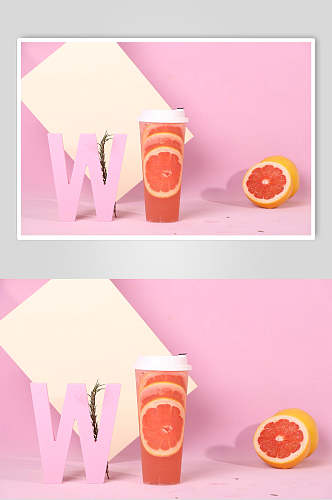 x满杯红柚果汁饮料摄影图