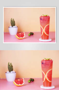 x满杯西柚果汁饮料摄影图