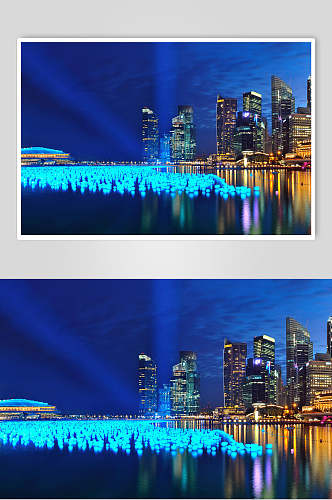 蓝色灯光河边繁华都市城市风景图片