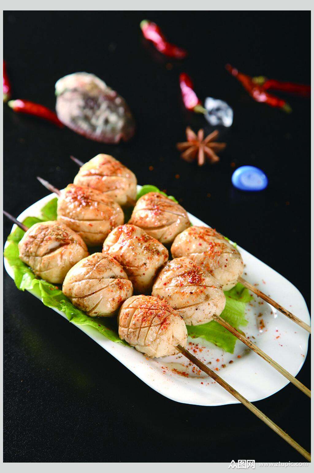 炭火烤墨鱼丸美食图片