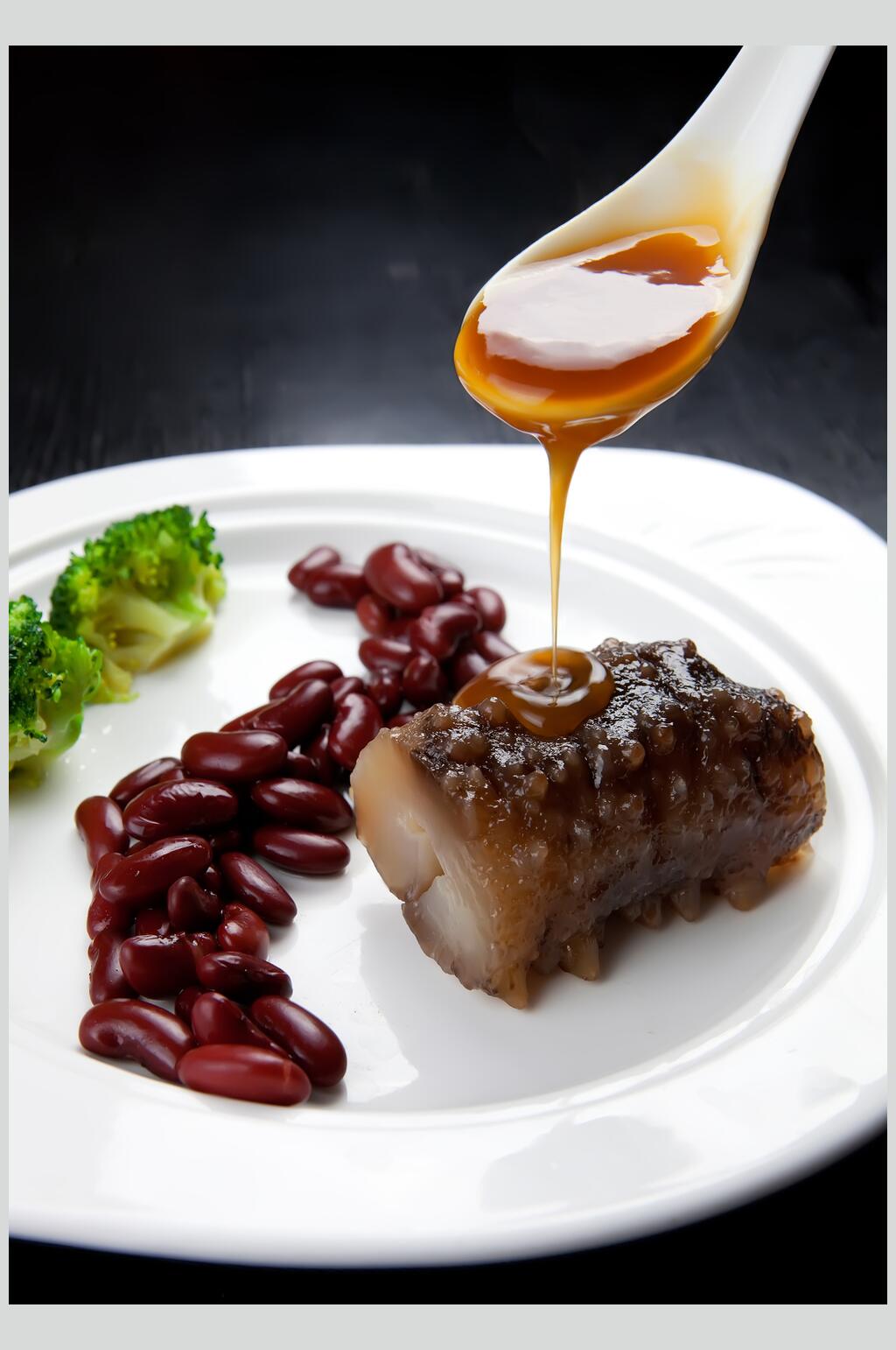 鲍鱼酱汁特写图片素材