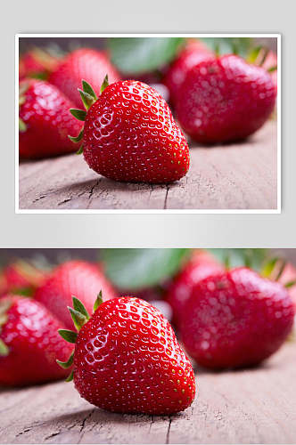 红彤彤的草莓采摘摄影图