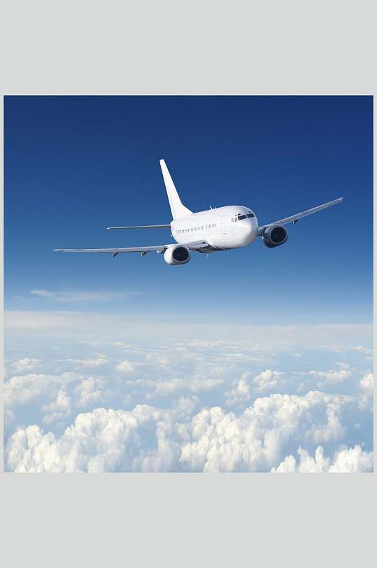 蓝天白云分界线客运客机民航飞机摄影图