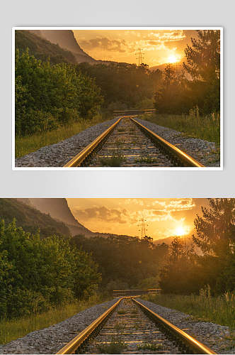 林间铁路夕阳风景摄影图片