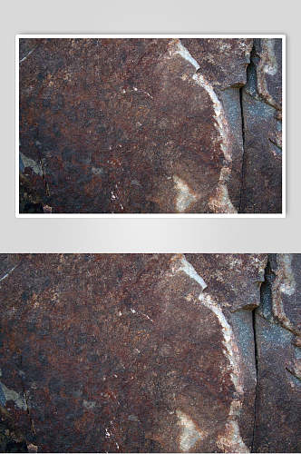 深褐色细粒岩石混凝土墙面摄影素材