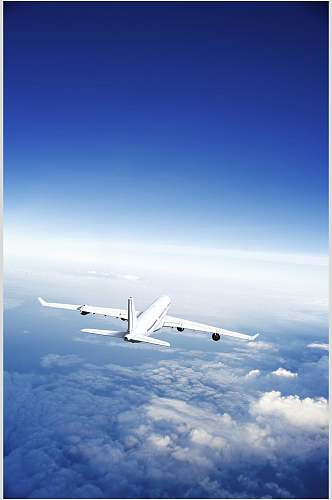 客运客机民航飞机云层之上飞机摄影图
