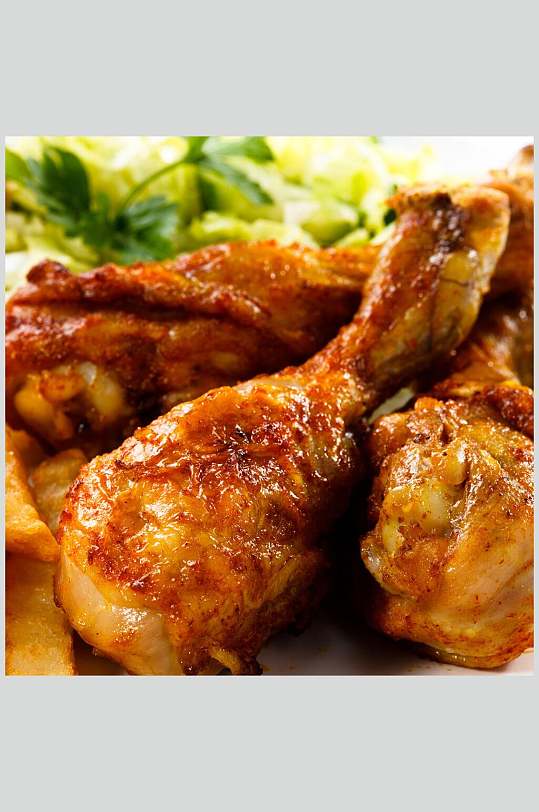金黄烤鸡腿美食图片