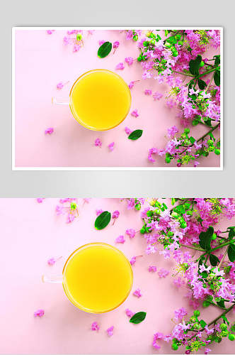 紫色花卉背景橙汁果汁饮料图片