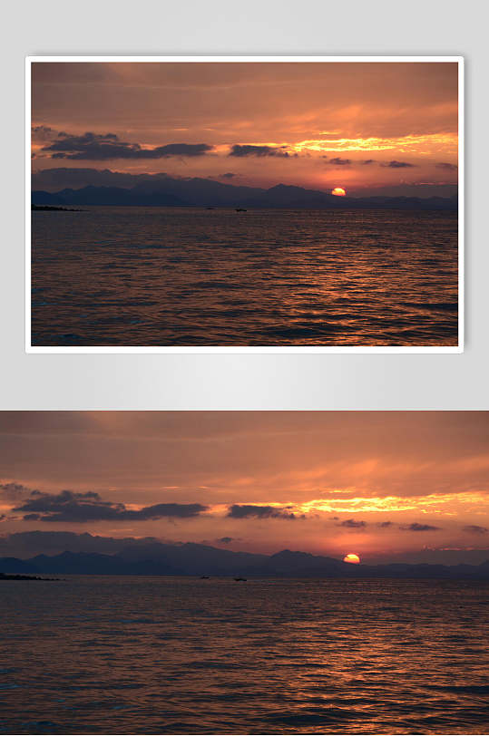 夕阳下的深圳南澳海边高清图片