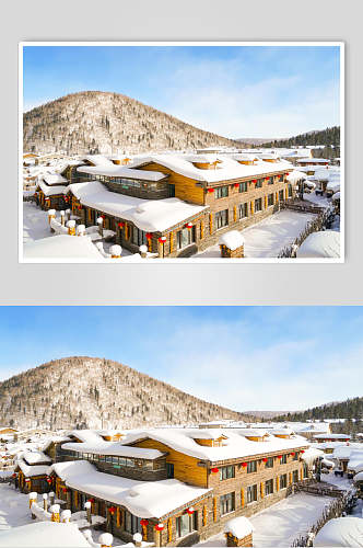 雪山下的村庄冬景图高清图片