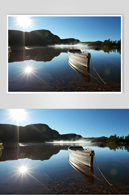 山峰湖泊小船风景图片