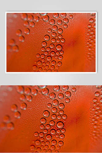 红色背景透明水珠雨滴图片