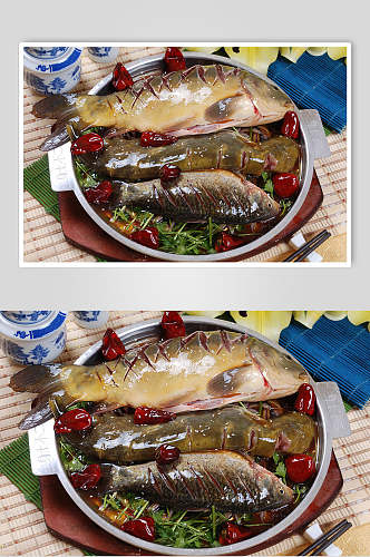 香辣石板三样鱼美食摄影图片