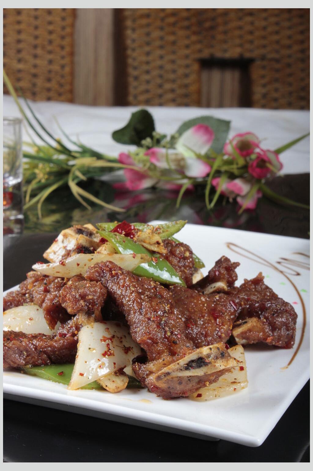 特色小炒牛仔骨美食图片素材