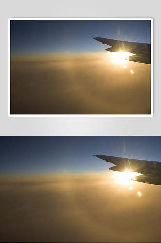 飞机机翼阳光云层朝霞晚霞景色图片