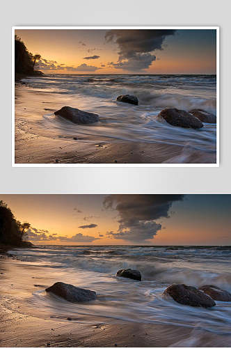 海边浪花岩石夕阳黄昏高清摄影图片