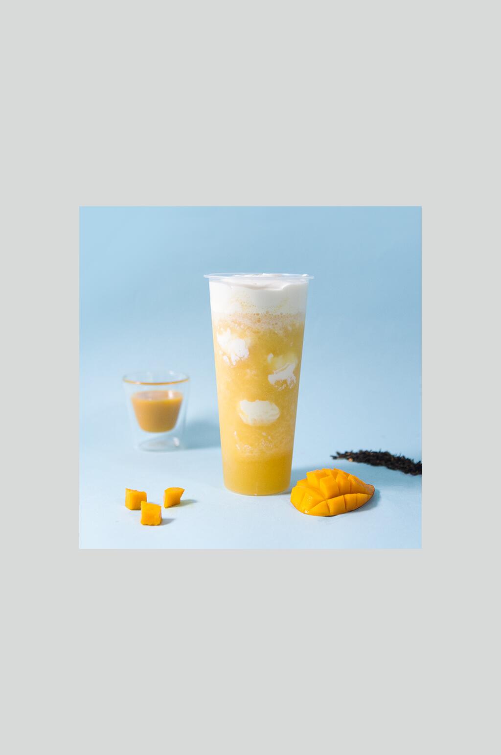 黄色奶茶芒果摄影图素材