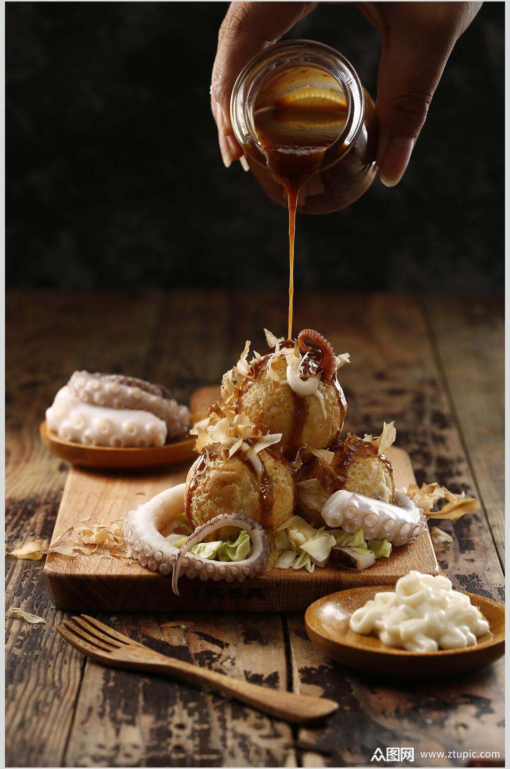 日式料理淋汁章鱼小丸子摄影图