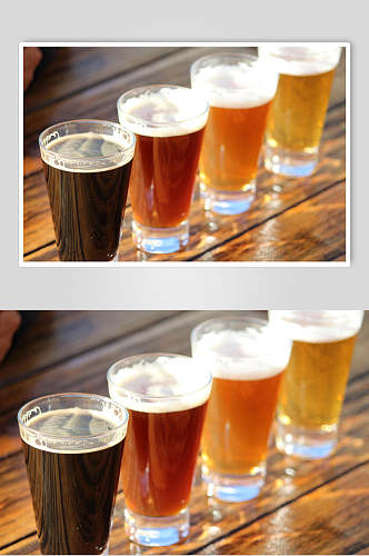 玻璃杯装全麦芽啤酒超清摄影图