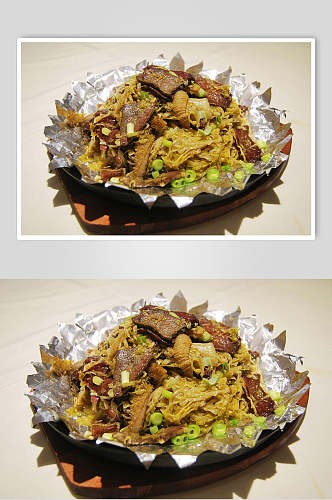 铁板酸菜牛肉食物摄影图片
