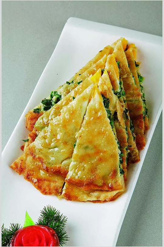 韭菜煎饼美食淮扬菜摄影图