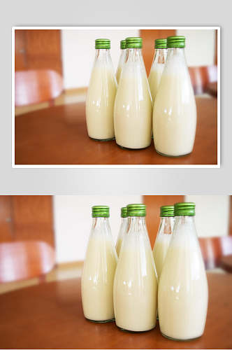 牛奶瓶纯白新鲜牛奶摄影图