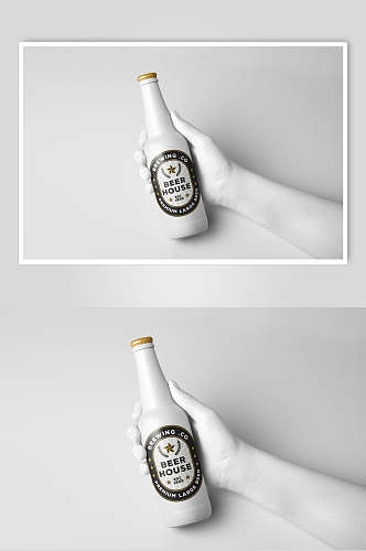 手掌灰色瓶子创意大气酒类包装样机