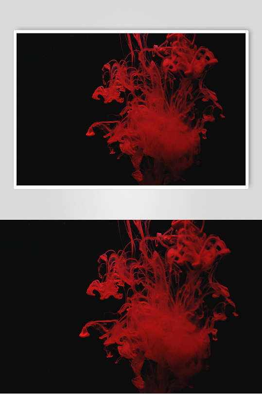 夜幕中的游离状血红色炫彩渐变动感烟雾图片