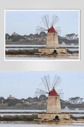 欧式风车水边图片