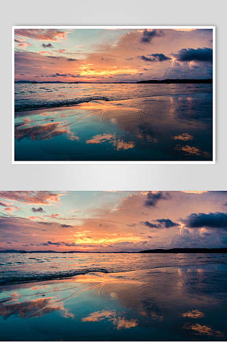 夕阳水中倒影海滩高清图片