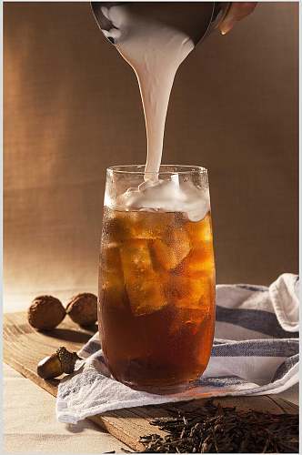 冰块褐色创意精致果汁奶茶摄影图片