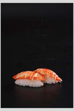 黑底三文鱼寿司美食摄影图片