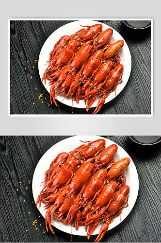 圆形白瓷盘一堆烹饪好的小龙虾图片