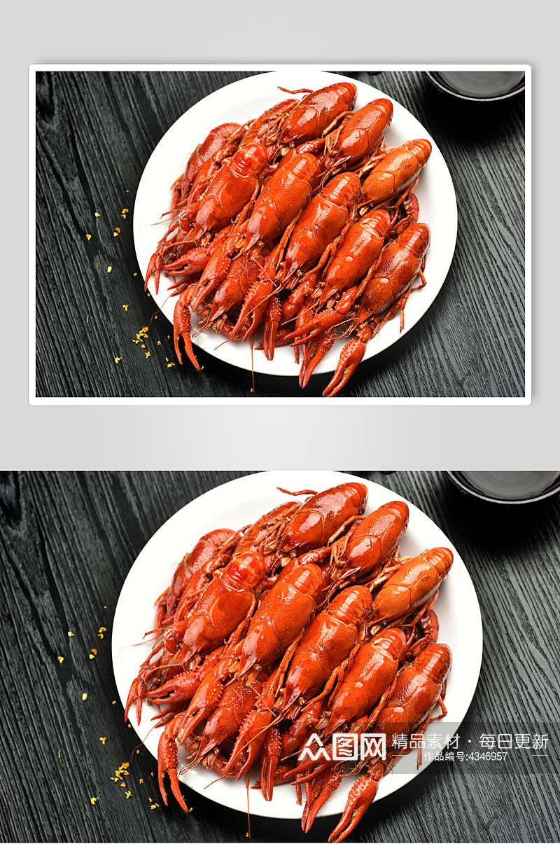 圆形白瓷盘一堆烹饪好的小龙虾图片素材