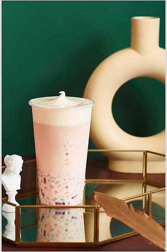 果粒椰果粉色奶盖奶茶图片