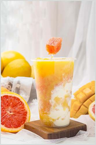 西柚芒果汁美味饮品创意摆拍图片