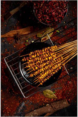 竹签玉米粒辣椒粉烧烤美食图片