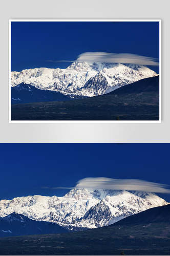 蓝天白云山间近景雪山雪景图片