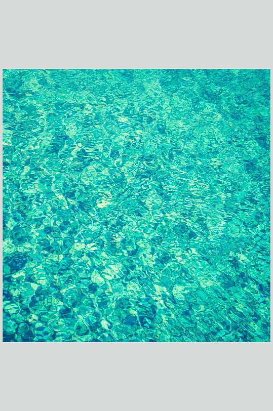 蓝绿色海浪波纹背景图片