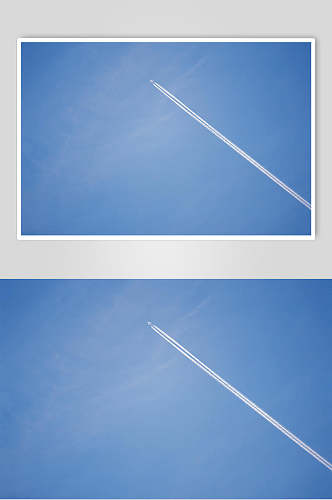 喷射白色烟柱蓝天白云图片
