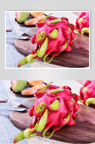 玫红色火龙果水果摆饰摄影图