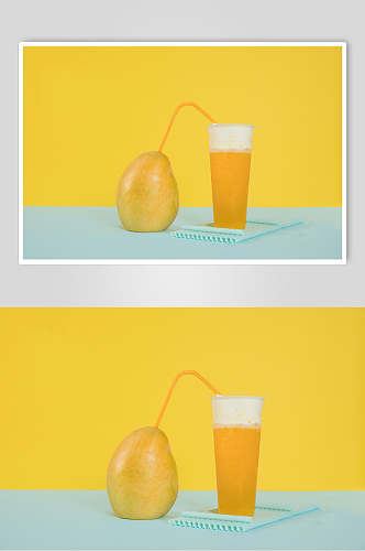 创意芒果汁水果饮品摄影图