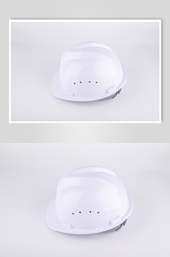 白色安全帽安全生产摄影图片