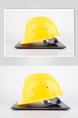 黄色安全帽安全生产摄影图片