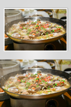 捞汁花甲餐厅菜品摄影图片